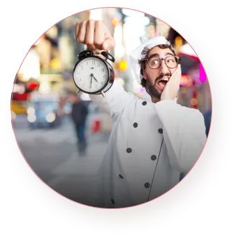 The cook looks at the clock